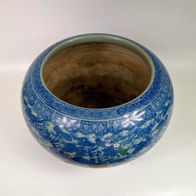 A beautiful Hibachi with a dragon and Phoenix motif. The design is unusual as there are areas that are etched or painted....