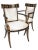 Early 19th Italian Regency, Neoclassical armchairs with finely carved details accented in gilt finish over the hand carved...
