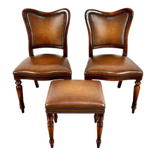 Theodore Alexander Tooled Leather Mahogany Chairs With Nailheads & Footstool - 3 Pieces For Sale
