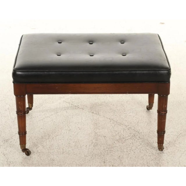 Hickory Chair Furniture Company campaign style walnut regency faux bamboo armchair and ottoman. Upholstered in black faux...