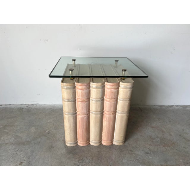 We are very pleased to offer for sale this magnificent vintage Hollywood Regency - style sculptural book shape side table...