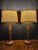A striking pair of vintage table lamps handcrafted from clustered natural bamboo, featuring beautifully detailed split-...