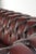 Cowhide Chesterfield 2.5-Seater Sofa in Oxblood Red For Sale - Image 13 of 14