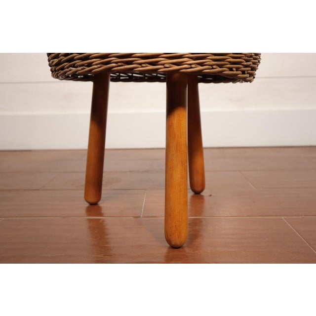 Vintage woven cane/wicker foot stool attributed to Tony Paul. It is in excellent vintage condition with some normal light...