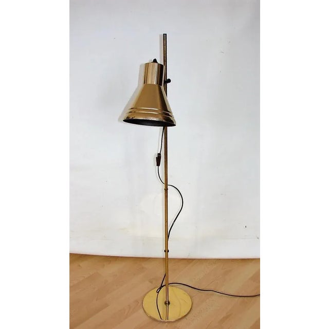 Floor lamp from OMI by Koch & Lowy, 1970s. It was made of metal and aluminum, has an adjustable lampshade. The lamp...