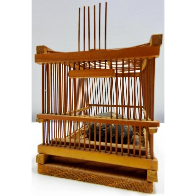 Your cricket can live in style in this antique cricket cage! There is a rock mounted on the inside with pieces of straw...