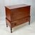 Antique southern sugar chest resting on turned-leg frame with a single lower drawer. The lower drawer front is made of...
