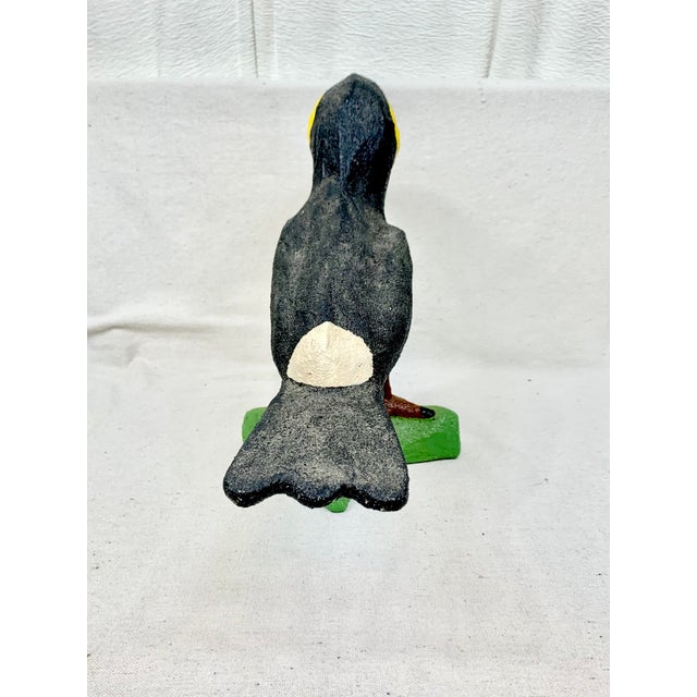 Colorful vintage toucan bird figurine. Made of papier-mâché. Bright colors and large size. Perfect to use as a colorful...
