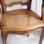 Walnut armchair with a seat and backrest in Viennese cane webbing, crafted in the Louis XV style, circa 1900. Despite the...