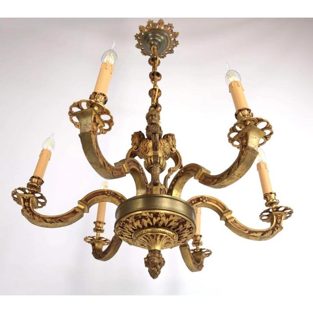 Heavy six-armed bronze chandelier in the style of louis xiv. Detailed workmanship. The chandelier was made in france,...