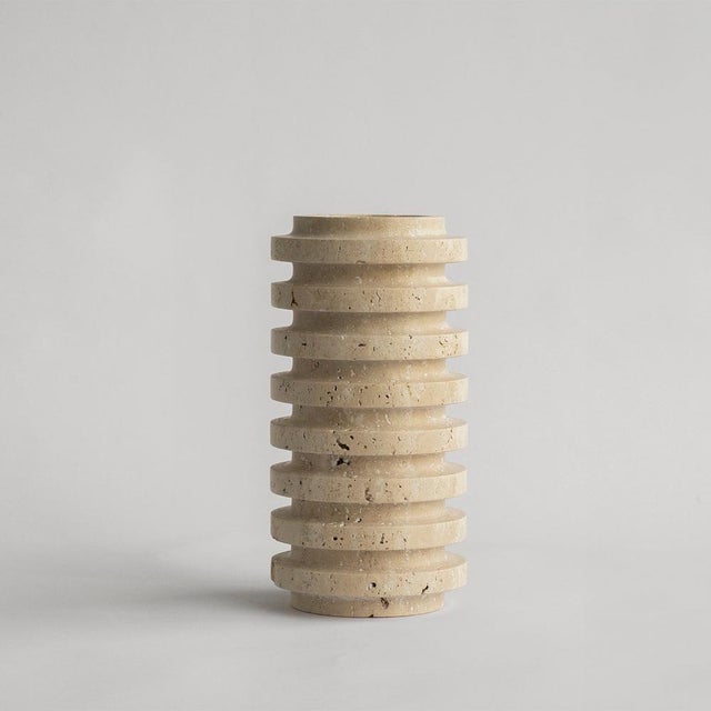 Introducing the travertine layer vase, a striking blend of natural beauty and contemporary design. Crafted from...