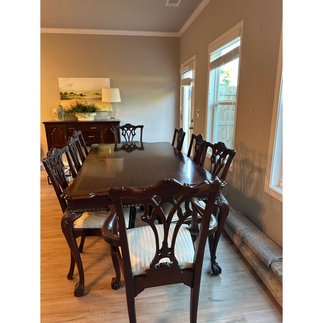 Elegant and timeless, this beautiful vintage dining set by Lexington Furniture features rich mahogany construction with...