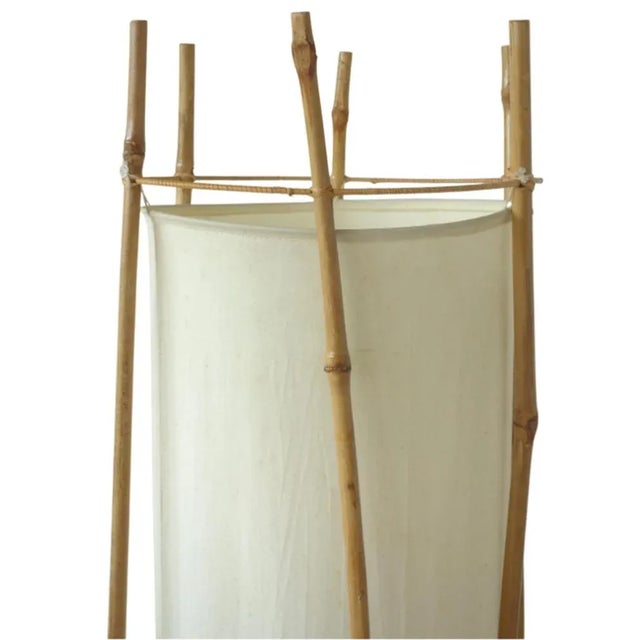 Louis Sognot bamboo floor lamp France, 1960 Six bamboo sticks Cylindrical cotton canvas shade Very good original condition...