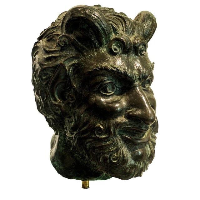 Bronze head sculpture realized by Giulio Aristide Sartorio, an Italian painter, sculptor and film director from Rome....
