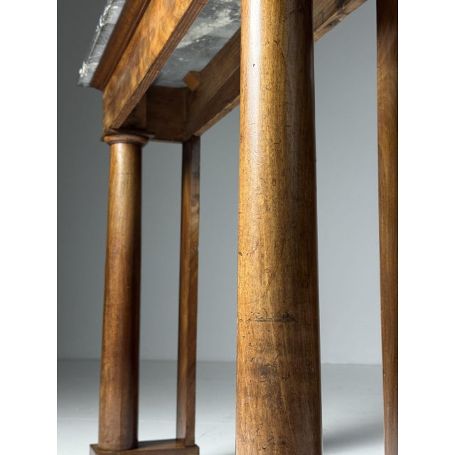 19th-century console / side table. Entirely in pine and mahogany veneer. Originating from France, early 19th century. with...