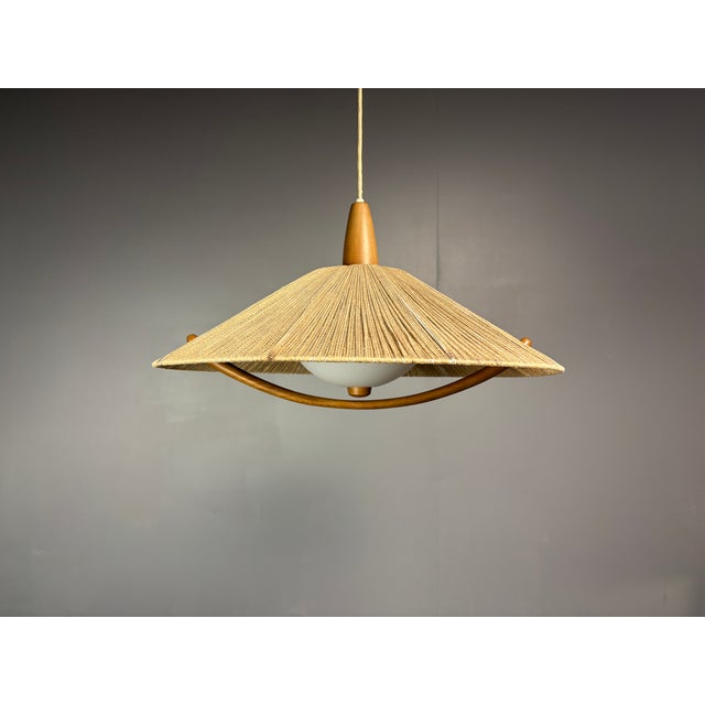 Large sisal and teak pendants by Temde, 1960s-1970s. We actually have three pieces of this model in stock. The other ones...