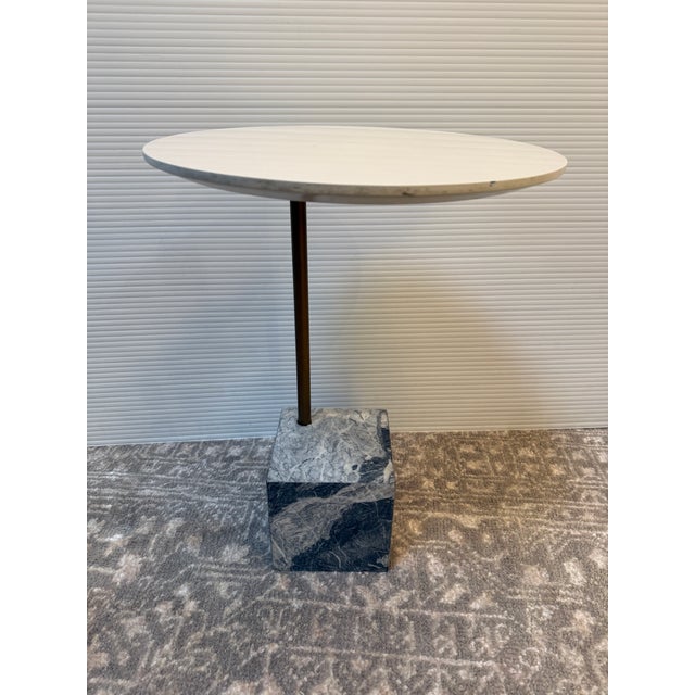 Design Plus Gallery presents a Cube C Table by West Elm. Planted in a beautiful cube or gray veined marble, the side table...