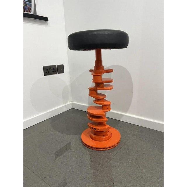 Combining automotive engineering with bespoke furniture design, each stool is created around an authentic engine...