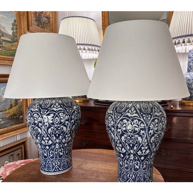 Absolutely lovely pair of Ralph Lauren blue and white ikat-patterned oversized lamps with rigid white linen shades. These...