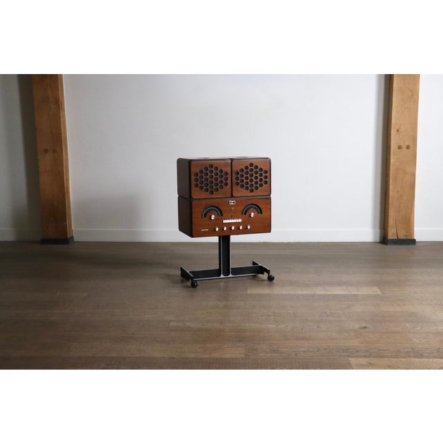 Nice Brionvega RR126 radio in walnut wood by Achille and Pier Giacomo Castiglioni, Italy 1960s. RR126 stereo system was...