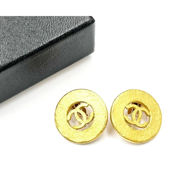 Chanel Vintage Gold Plated CC Round Cutout Clip on Earrings *Marked 94 *Made in France *Comes with the original box...