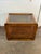 Great mid century BoHo Chic end table. Hefty wood frame with cane sides and lower shelf, smoked glass top. Very period...