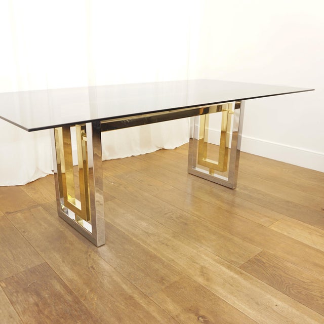 Dining Table, 1950 with gold and silver base. The top glass is removable. This piece is attributed to the mentioned...