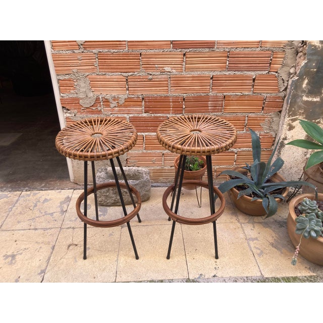 Pair of Dirk van Sliedrecht Dirk bar stools ,made by Rohé Noordwolde Netherlands 1950s. Black lacquered metal, rattan...