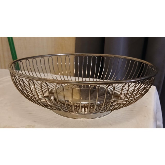 Vintage silver-plated wire bread or fruit serving basket, 1960s, made in Italy. Makes a great basket for the table because...