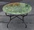 Beautiful handcrafted Moroccan mosaic table featuring an elegant green color palette. Measuring 48 inches in diameter,...