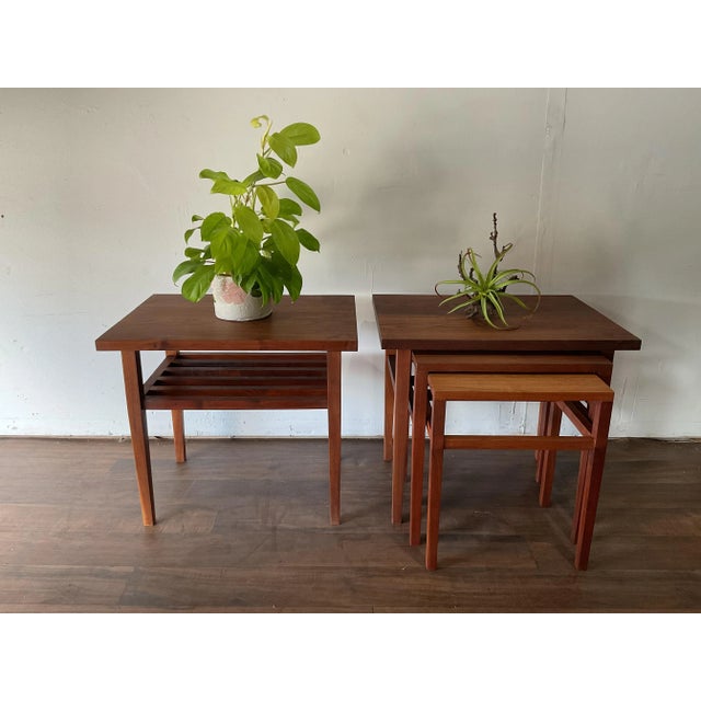 Rare Four piece set! Mid century Danish modern solid teak two-tier side table with matching three piece nesting tables....