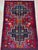 Afghan Balouch rug, hand knotted in Afghanistan from 100% wool. Measuring 2’8” x 4’4”, this vibrant tribal rug features...