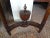 18th century French Louis XVI carved walnut demi lune console table with a 1.25" slab of black and white marble top....
