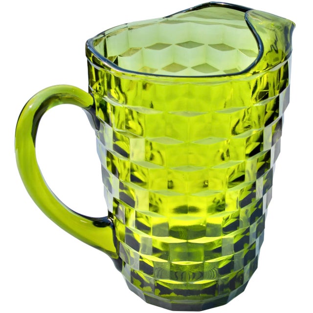 Midcentury heavy glass pitcher and centerpiece in color green, handcrafted with elegant textured diamond-pattern and...