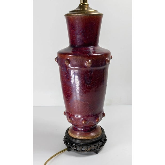 We are selling this pretty Chinese style Flambe purple-red vase mounted as lamp. The lamp appears to probably be French or...