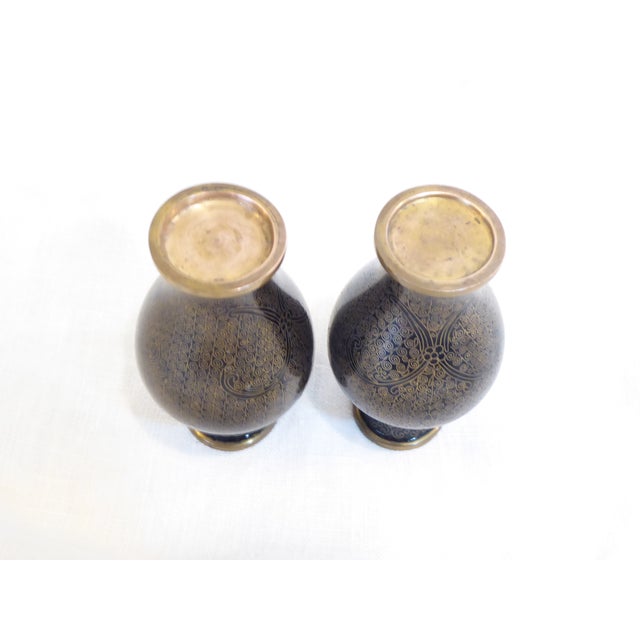 This pair of small vases have a finely wrought cloisonne.