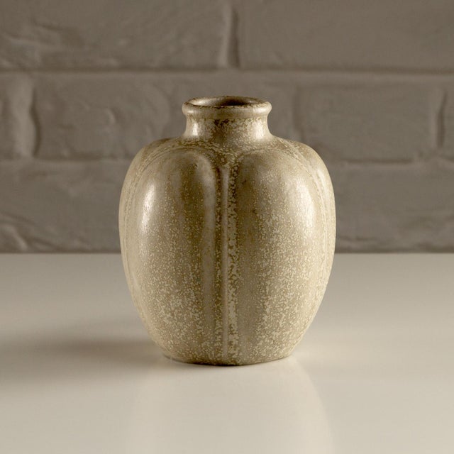 Pale stone, matte-glazed Model 148 vase by Arne Bang, Denmark, 1930s. Incised AB signature on the base. Incised marks are...