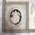 An exquisite oversized antique French Aubusson tapestry, dating from approximately 1930. This textile piece showcases a...