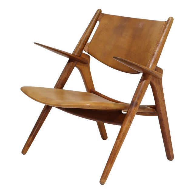 CH28 Lounge Chair in Oak and Cognac Leather by Hans J. Wegner, Denmark, 1950s For Sale