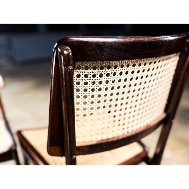 Pair of “Cadeira Com Assento Curvo” Chairs in Rosewood and Cane by Joaquim Tenreiro, Brazil, 1960s For Sale In New York - Image 6 of 12
