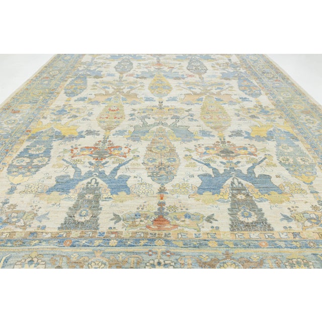 Elevate your space with the understated elegance of this Modern Sultanabad hand-knotted rug. This piece reimagines...
