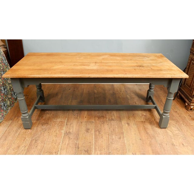 A substantial and characterful english farmhouse dining - or refectory table of excellent proportions. Bought from a...