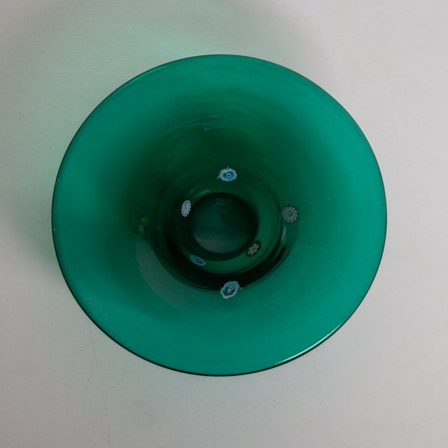 Charming small sea-green Murano glass bowl featuring a spray of blue, white and red millefiori elements. Perfect as a...