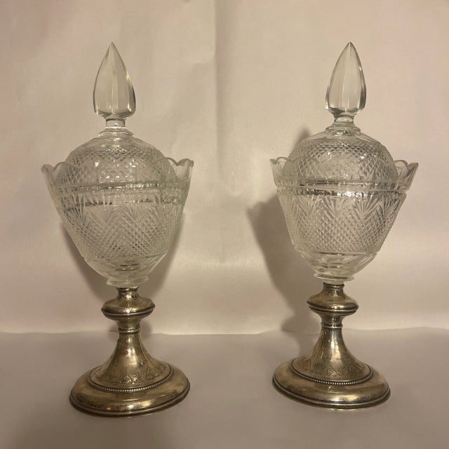 Antique Circa 1900s Crystal Compote or vase or urn with scalloped edge and diamond cut lid, standing on a sterling silver...