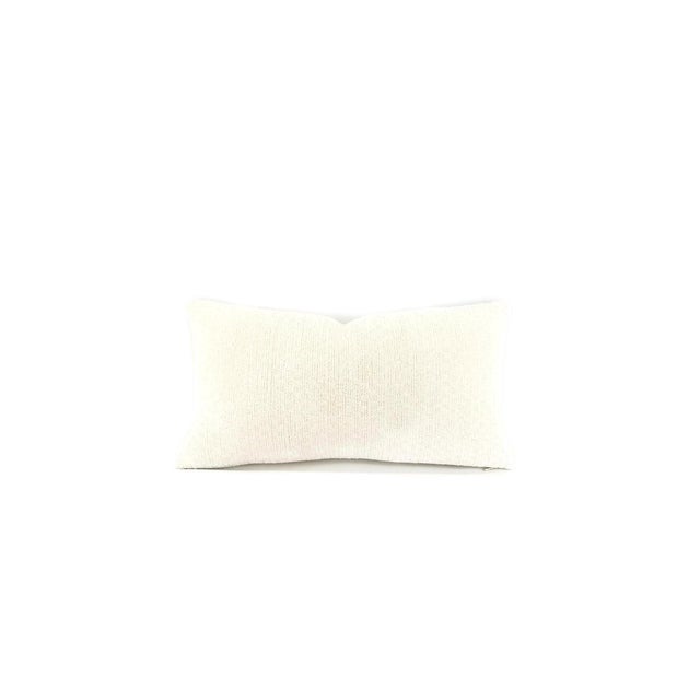From Beach Hill is Arches in the color white pillow cover. This is a thick tread woven chenille in a silky white color. A...
