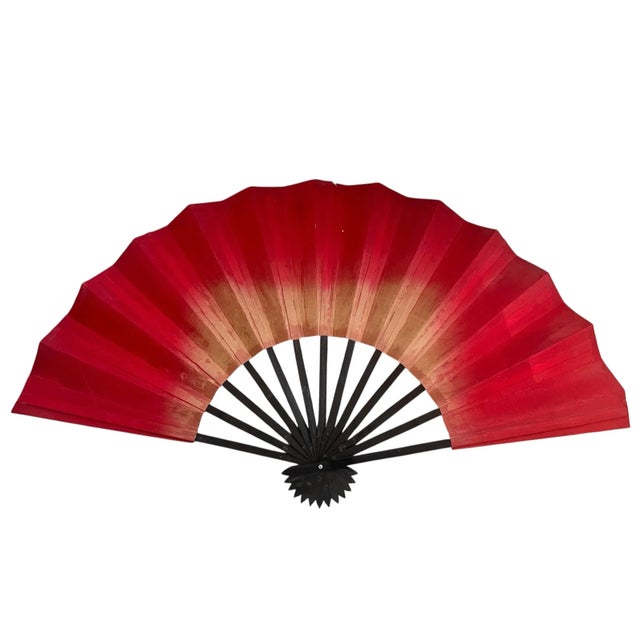 This vintage large Chinese fan features intricate hand-painted artwork of a peacock and peony, showcasing traditional...