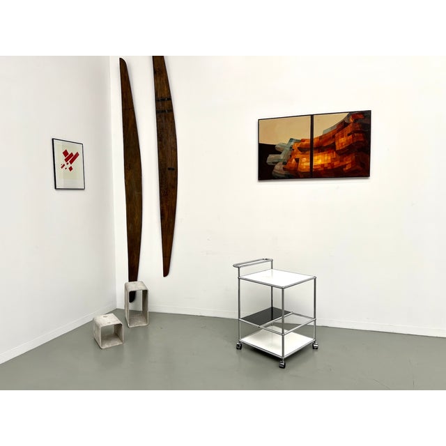 Maison lecan presents this usm haller bar cart, produced in the 1980s. an icon of swiss modular design, this model...