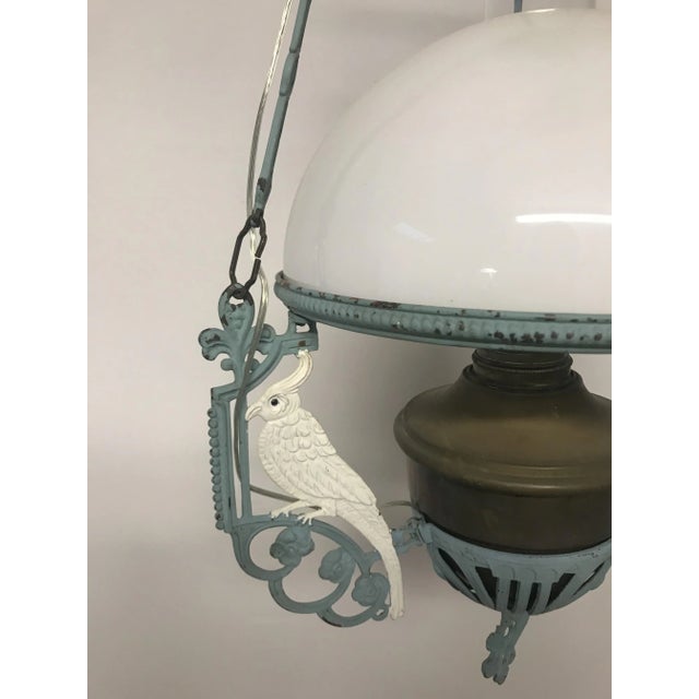 - Vintage pendant with parrots - Features a painted metal frame - Has a white Acrylic glass shade - Fitted with a glass...