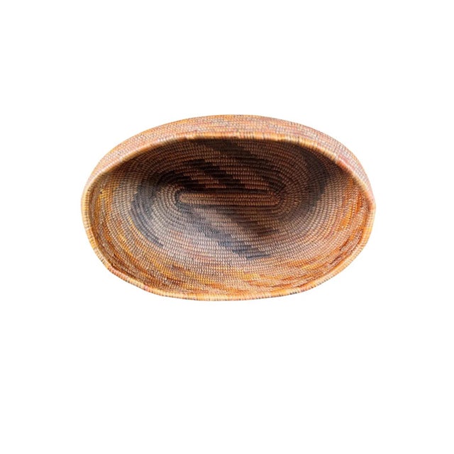 Finely woven California Mission basket, expertly constructed in traditional coiled technique using natural plant fibers...