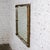 Marvelous vintage Neoclassic to Rococo rectangular large wall mirror with ornate gilded frame featuring a distressed...